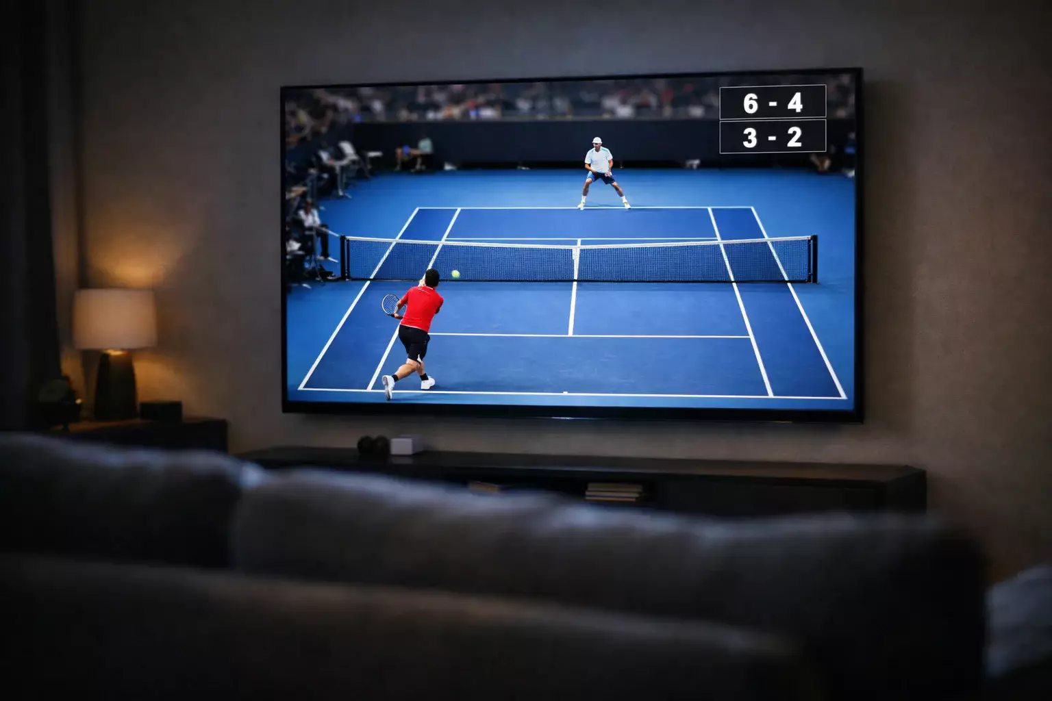 Pantalla mostrando marcador de partido de tenis en tiempo real